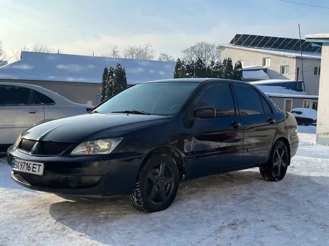 Mitsubishi Lancer - фото 1