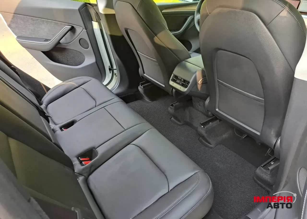Tesla Model Y - фото 11