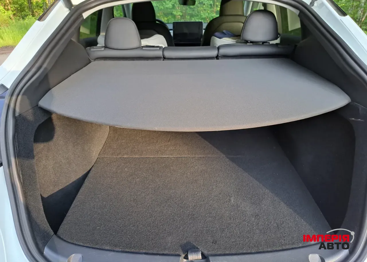 Tesla Model Y - фото 14