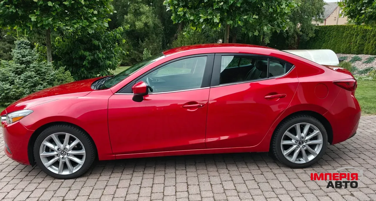 Mazda 3 - фото 6