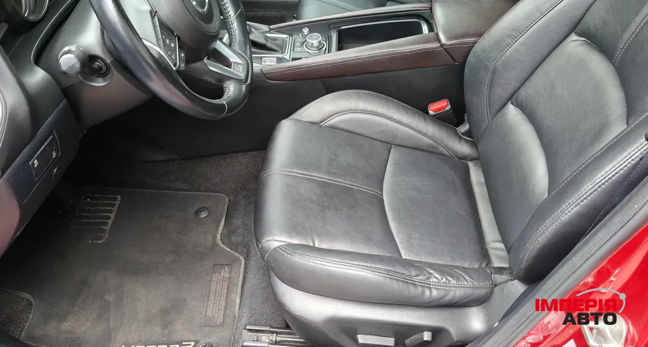 Mazda 3 - фото 8