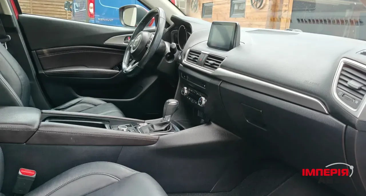 Mazda 3 - фото 7