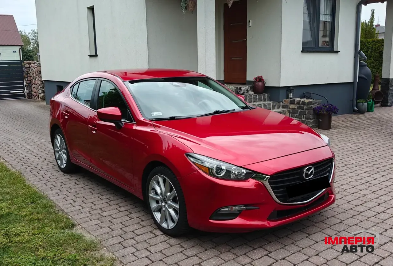 Mazda 3 - фото 3