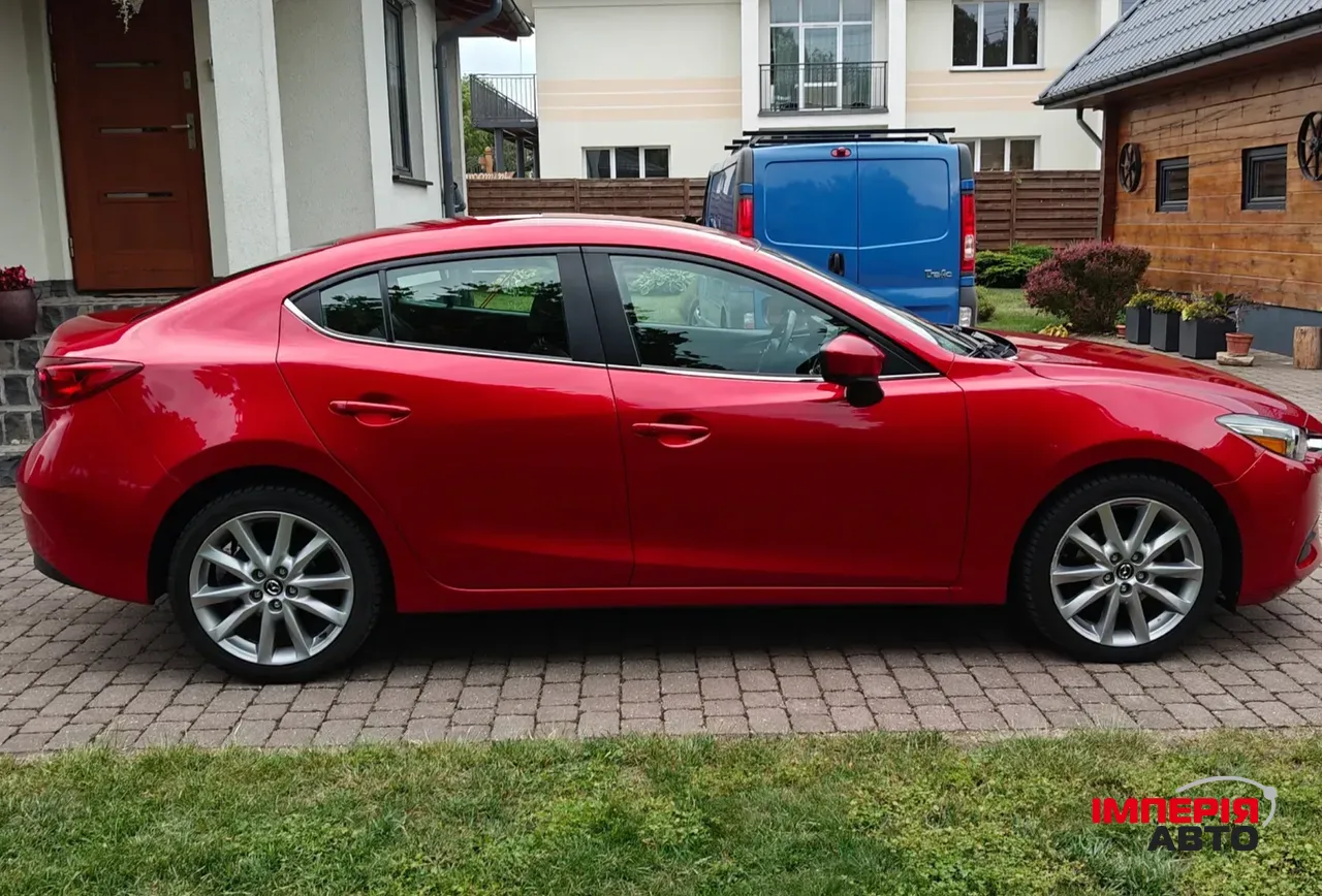 Mazda 3 - фото 4