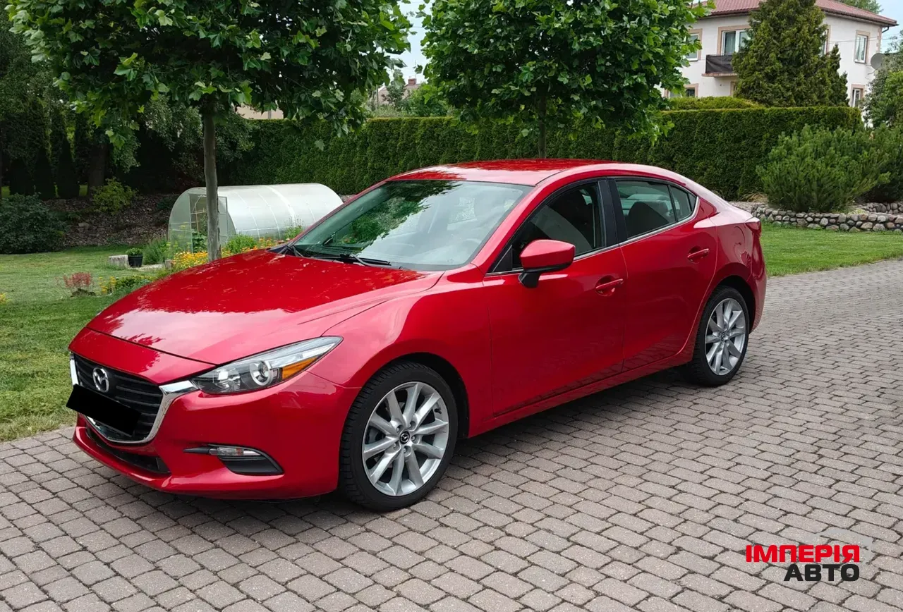 Mazda 3 - фото 1