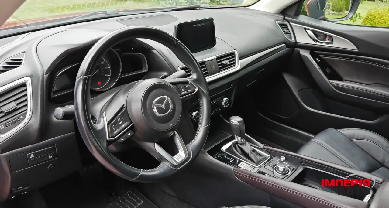 Mazda 3 - фото 9
