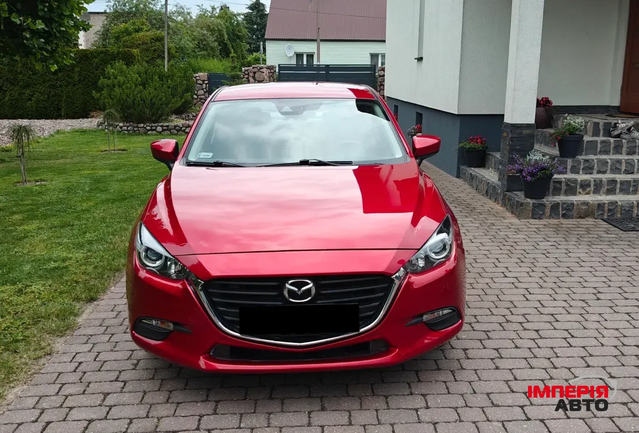 Mazda 3 - фото 2