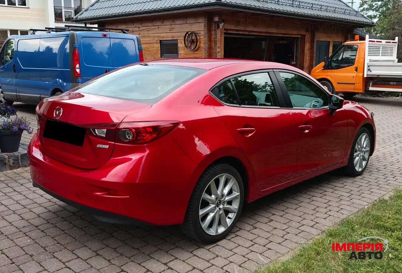 Mazda 3 - фото 5