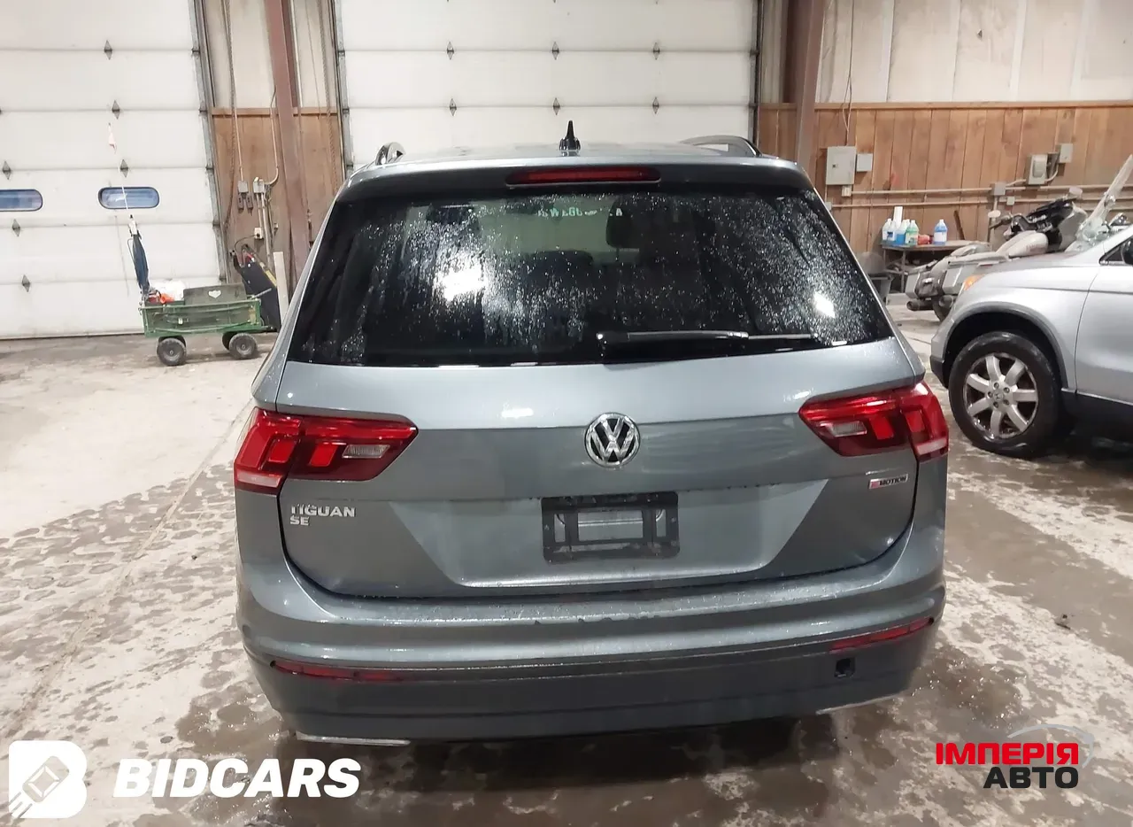 Volkswagen Tiguan - фото 5