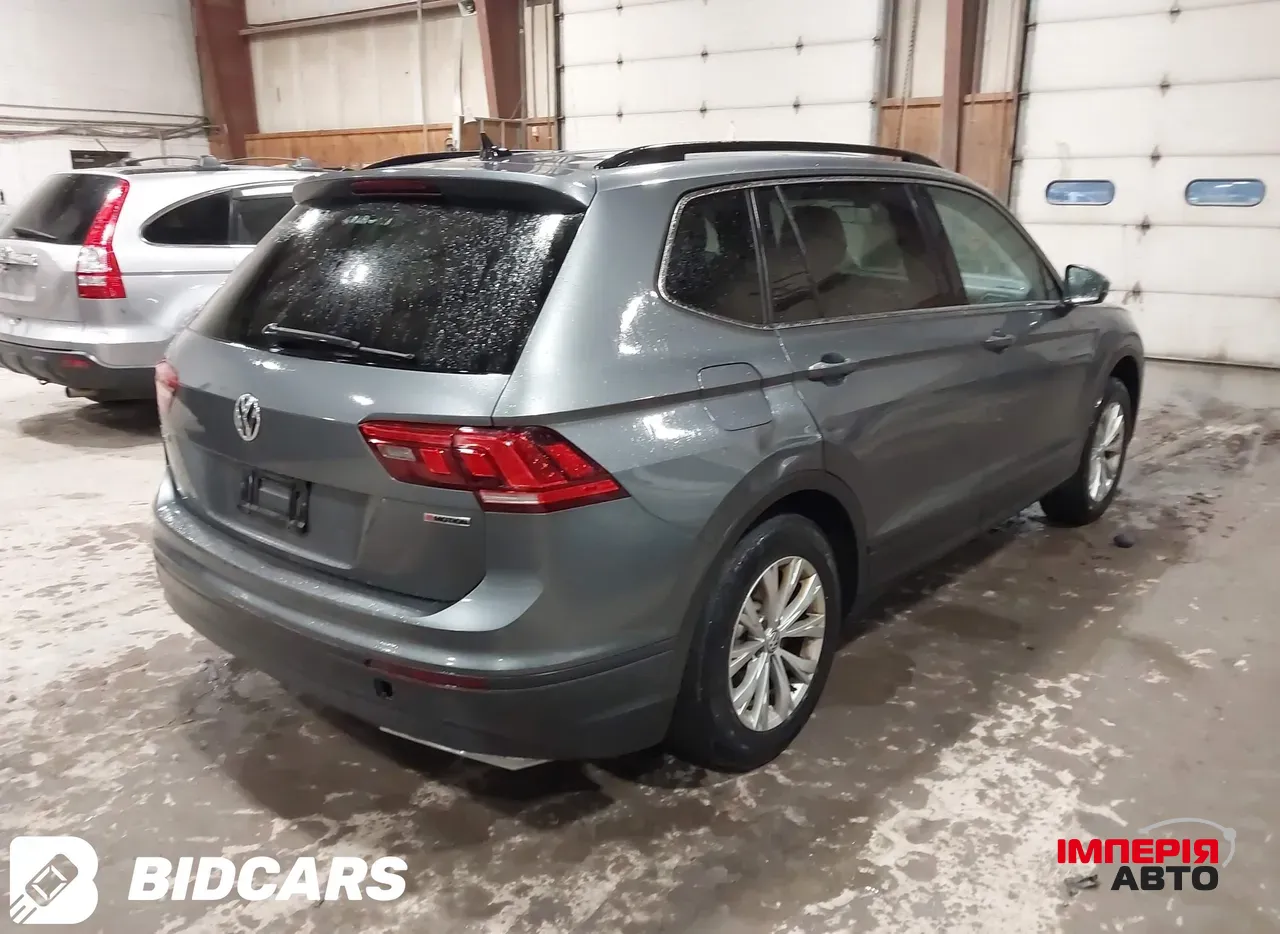 Volkswagen Tiguan - фото 6