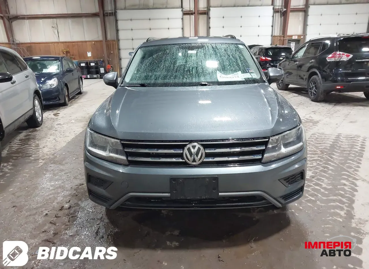 Volkswagen Tiguan - фото 2
