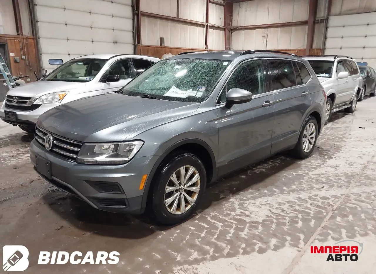 Volkswagen Tiguan - фото 3