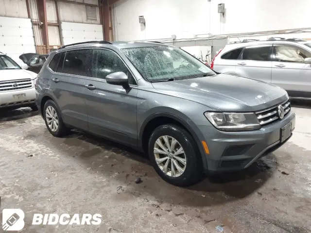 Volkswagen Tiguan - фото 1