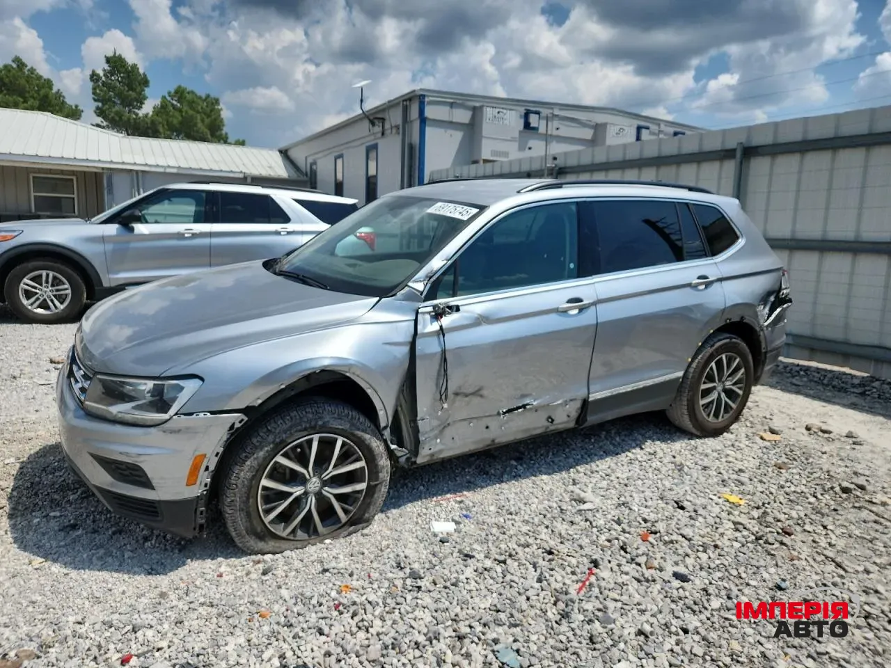 Volkswagen Tiguan - фото 1