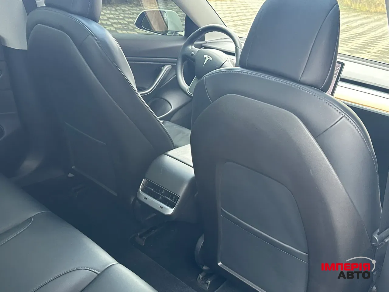 Tesla Model 3 - фото 9