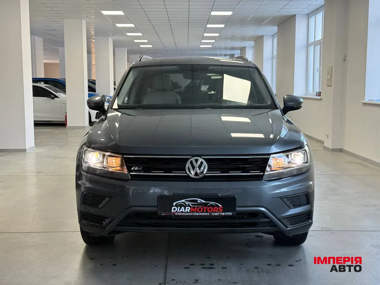 Volkswagen Tiguan - фото 2