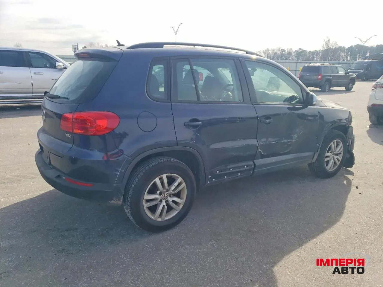 Volkswagen Tiguan - фото 6