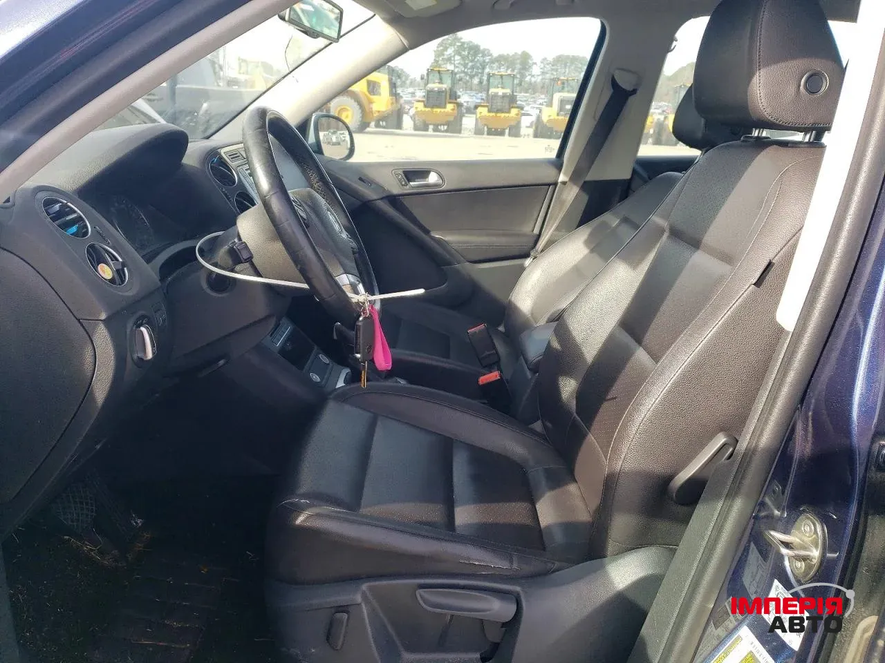 Volkswagen Tiguan - фото 7