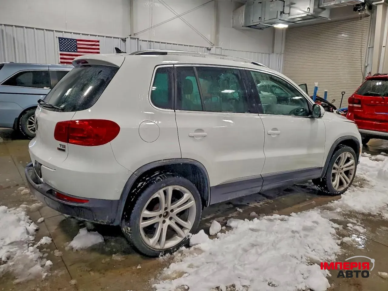 Volkswagen Tiguan - фото 6