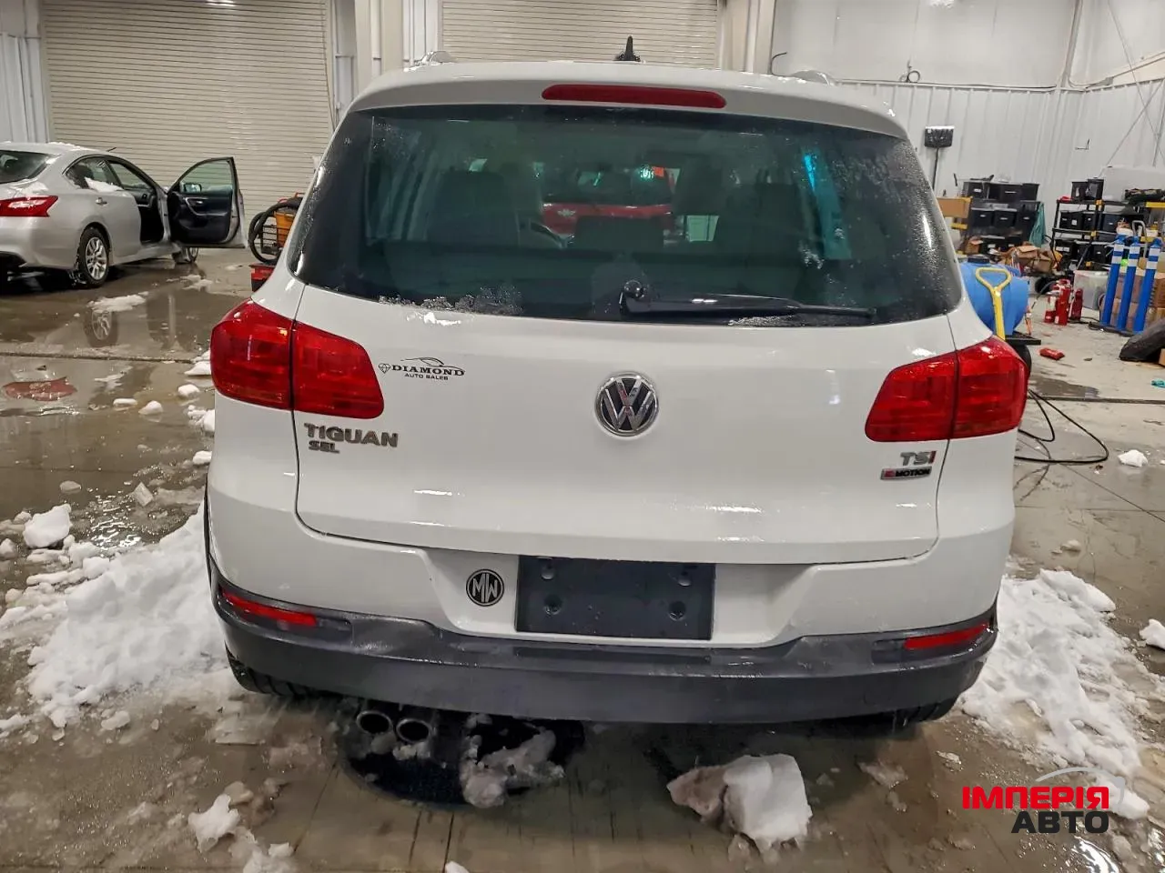 Volkswagen Tiguan - фото 5
