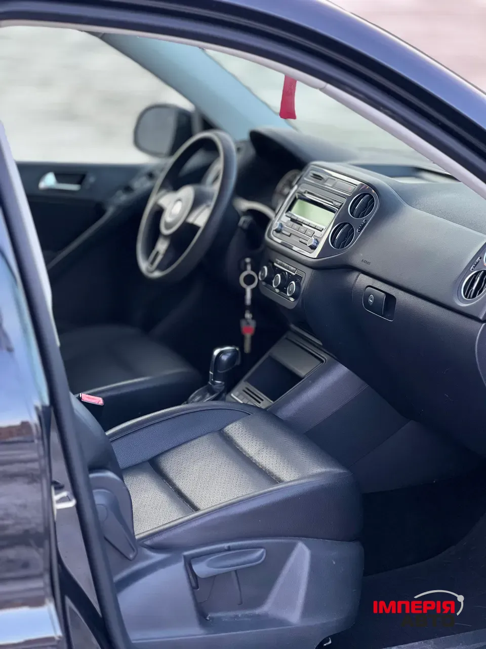 Volkswagen Tiguan - фото 13