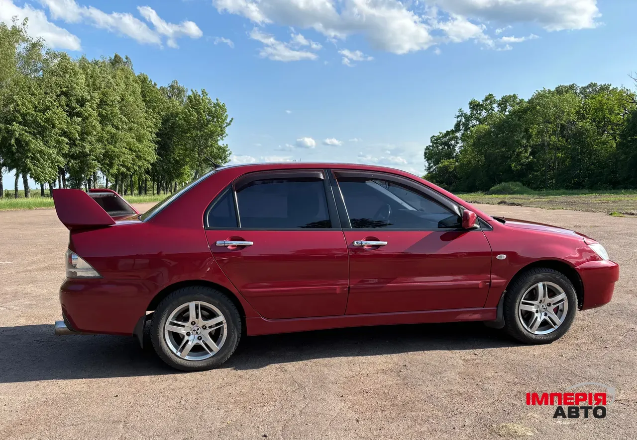 Mitsubishi Lancer - фото 7