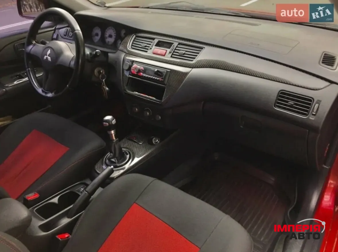 Mitsubishi Lancer - фото 11