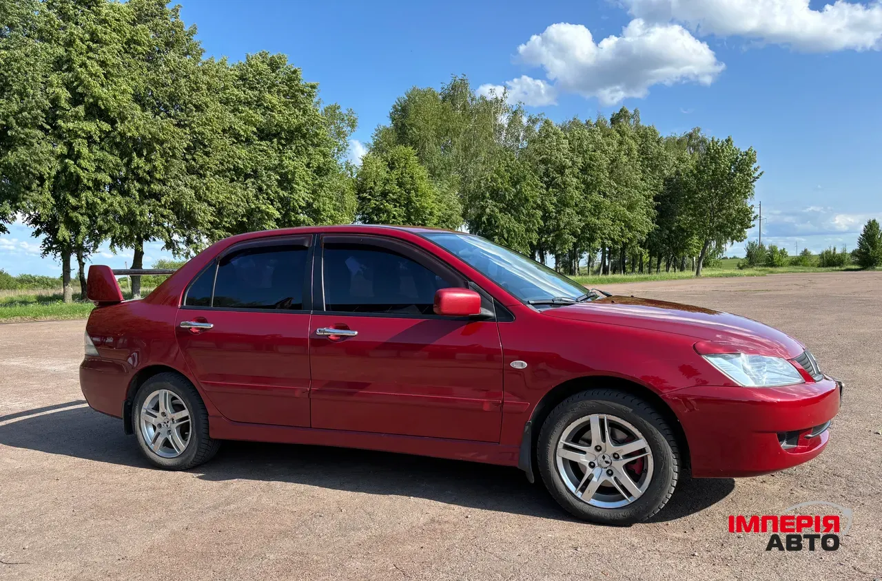 Mitsubishi Lancer - фото 8