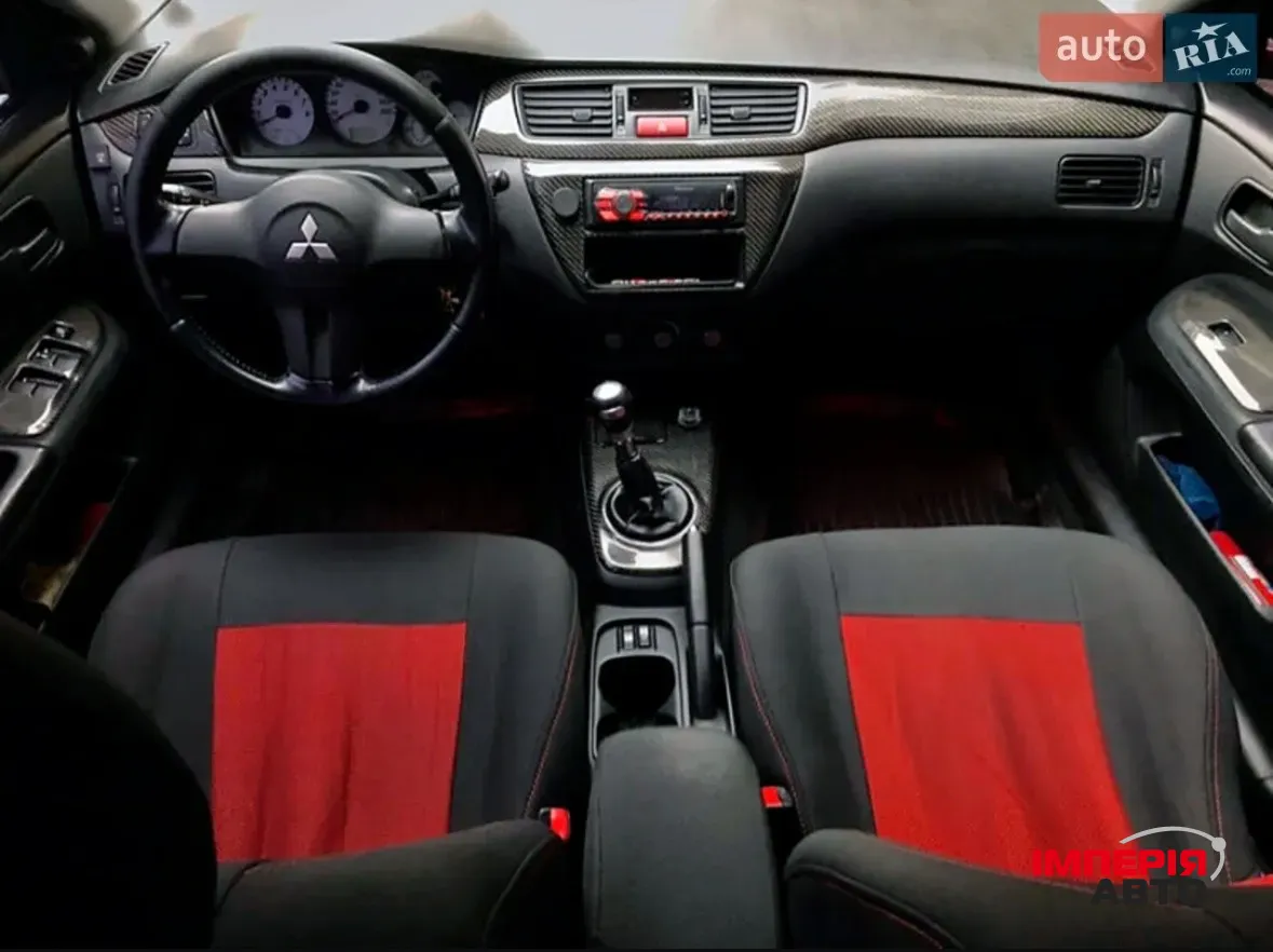 Mitsubishi Lancer - фото 4