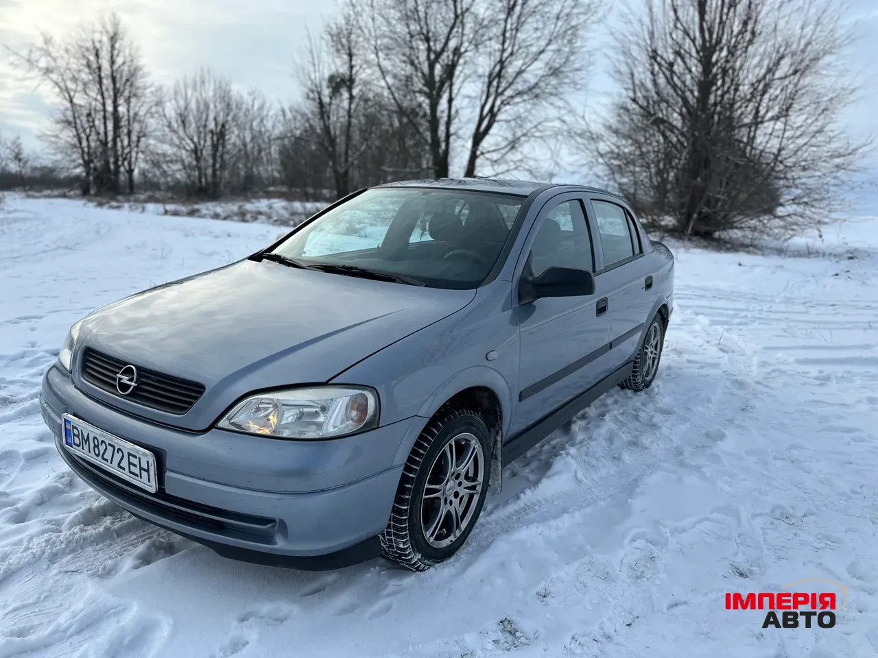 Opel Astra - фото 1