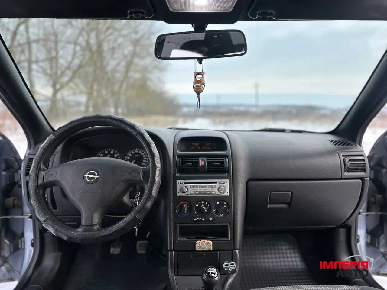 Opel Astra - фото 5