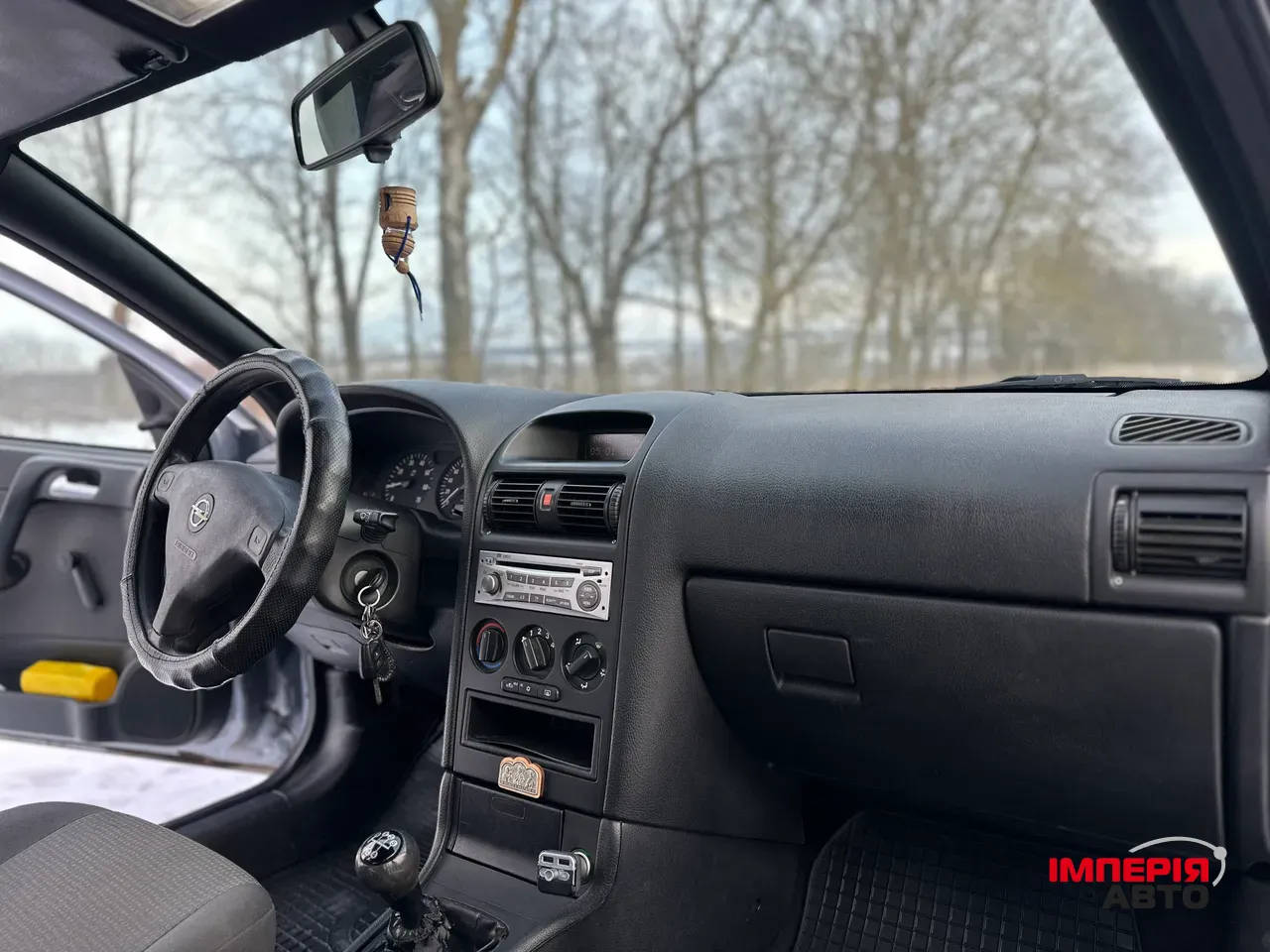 Opel Astra - фото 6