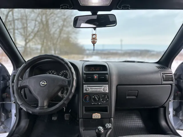 Opel Astra - фото 5