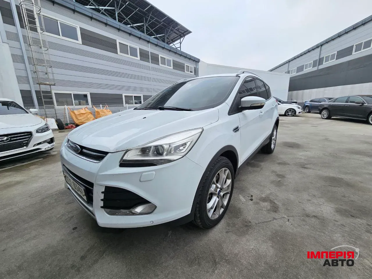 Ford Kuga - фото 1