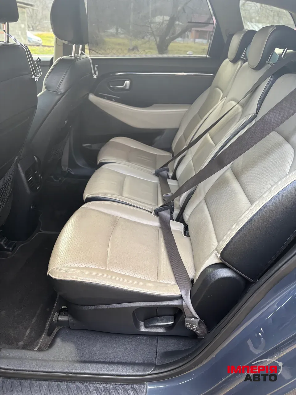 Kia Carens - фото 9