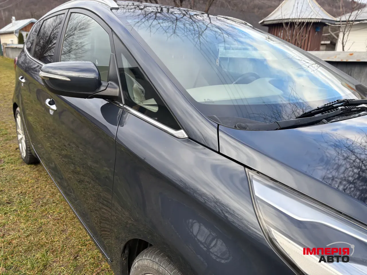 Kia Carens - фото 5