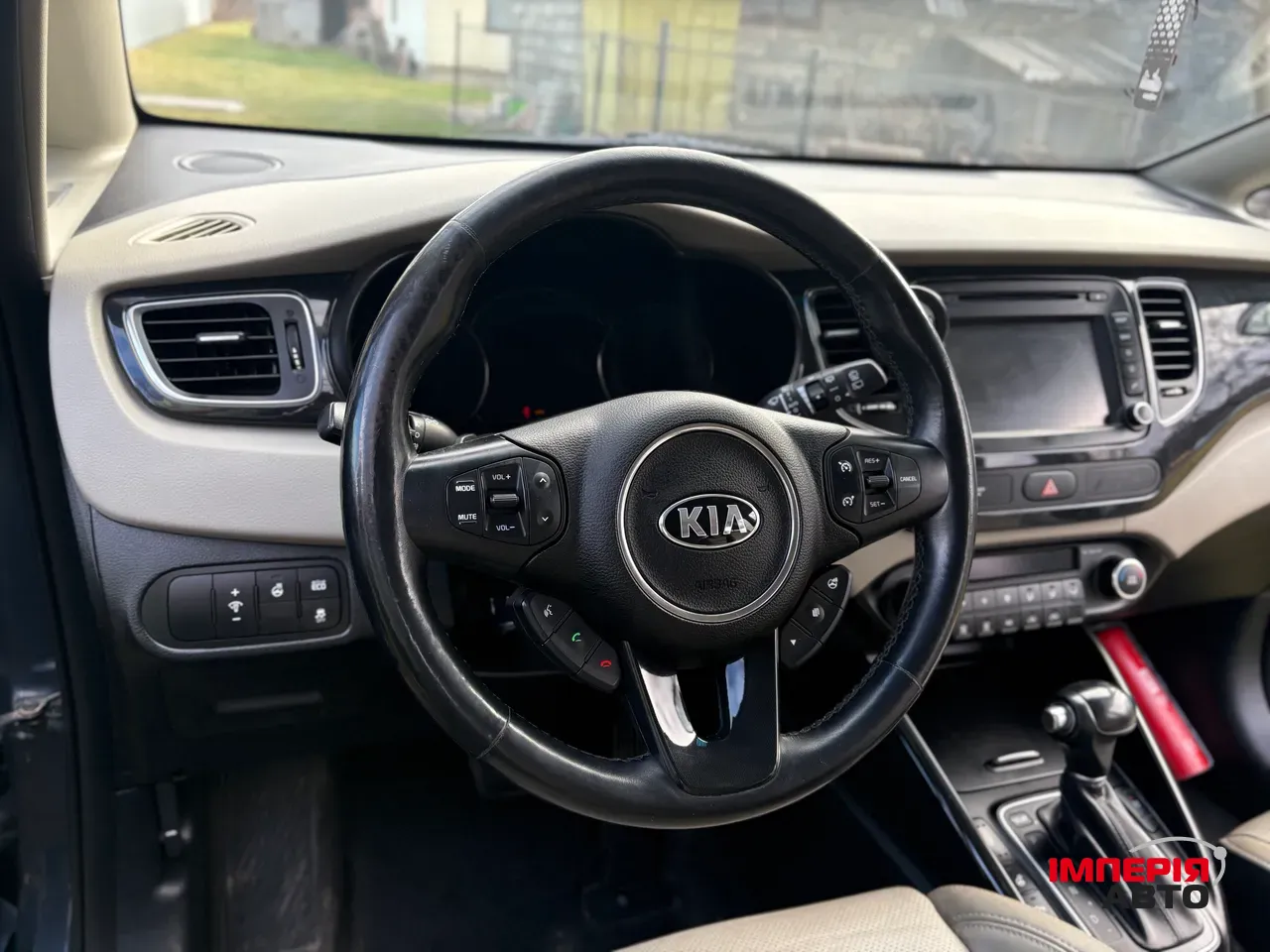 Kia Carens - фото 8