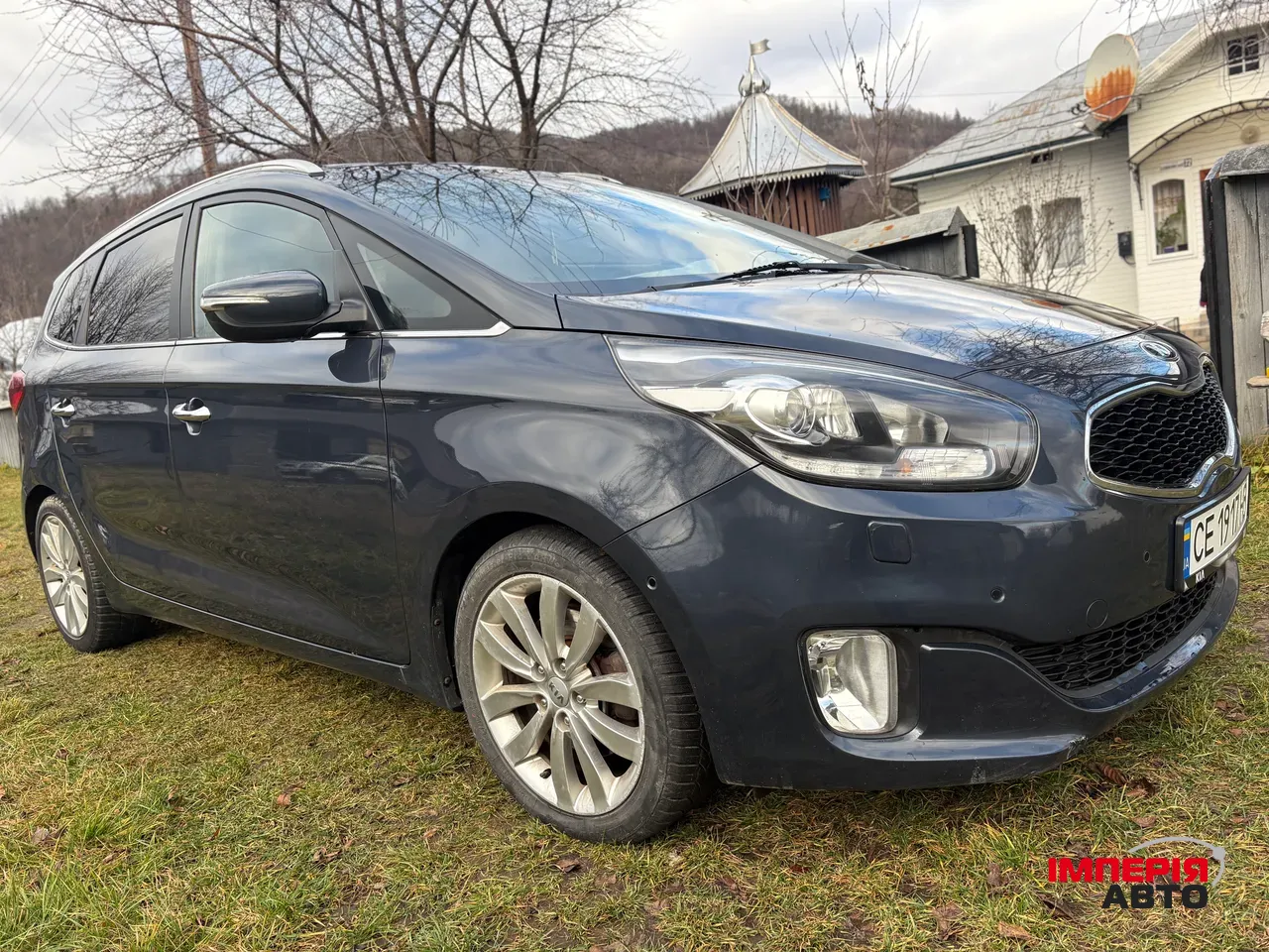 Kia Carens - фото 4