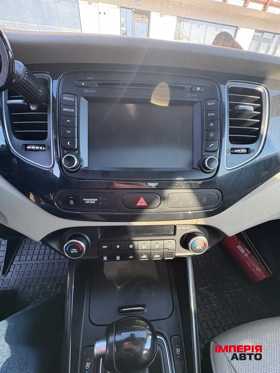 Kia Carens - фото 11