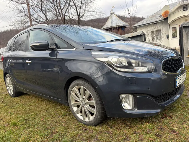 Kia Carens - фото 4