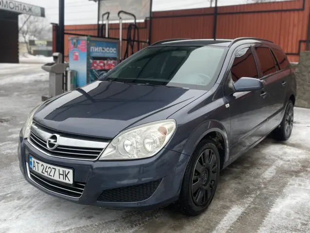 Opel Astra - фото 1
