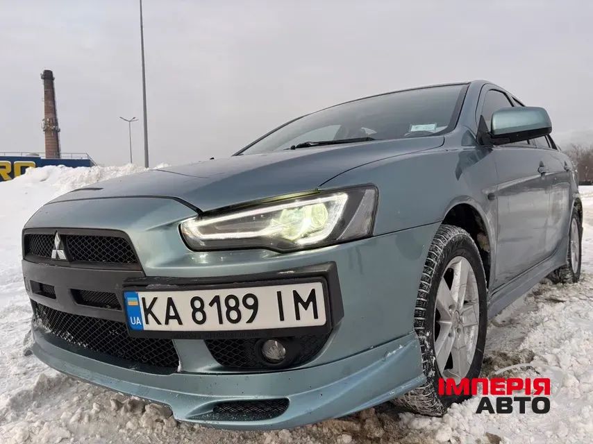Mitsubishi Lancer - фото 1