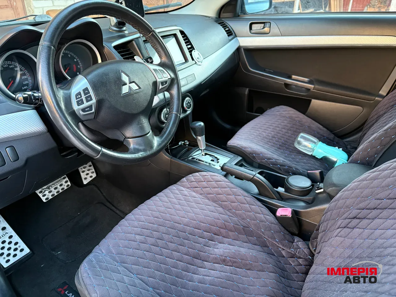 Mitsubishi Lancer - фото 11