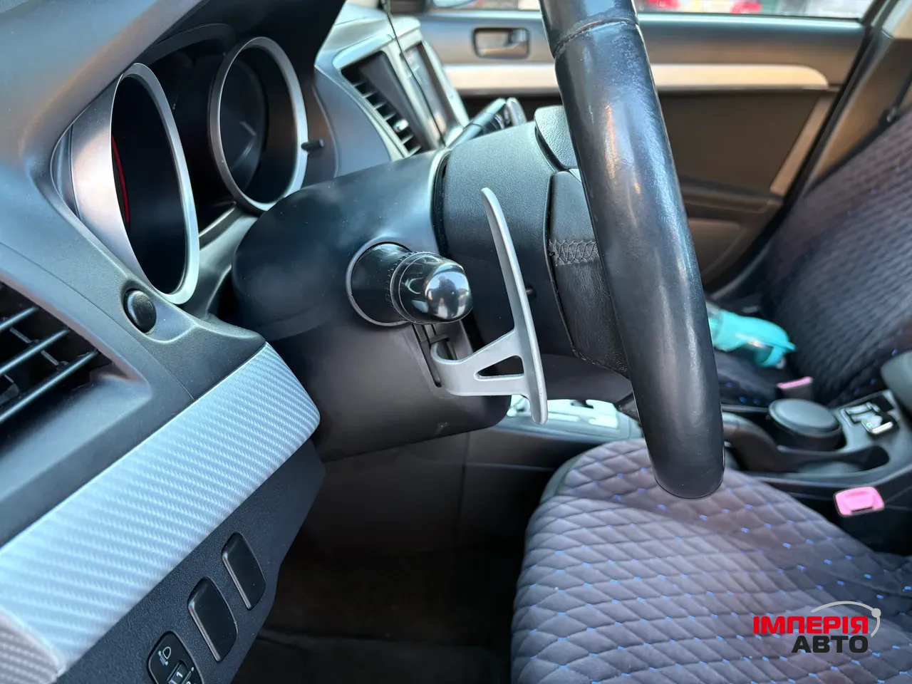 Mitsubishi Lancer - фото 9