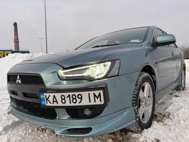 Mitsubishi Lancer - фото 1
