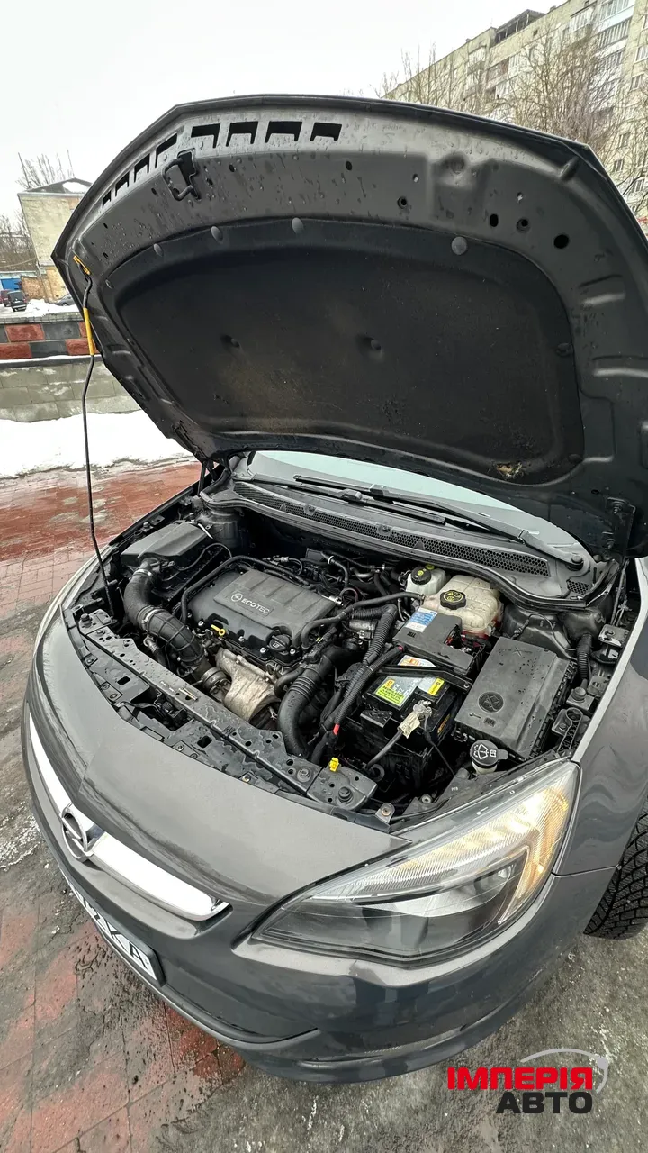 Opel Astra - фото 11