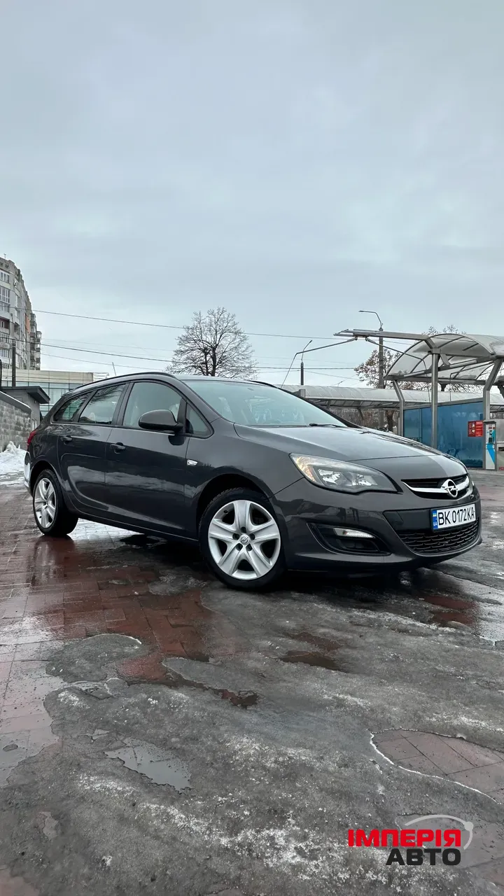 Opel Astra - фото 1
