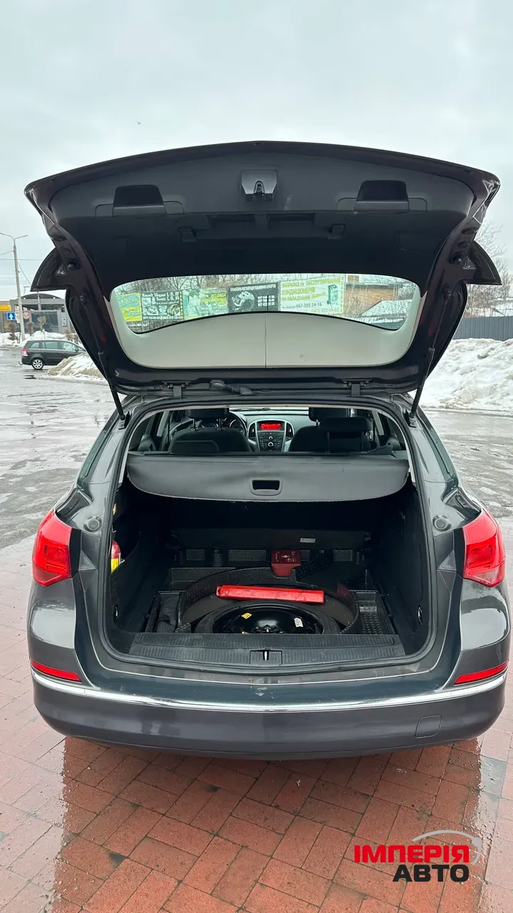 Opel Astra - фото 8