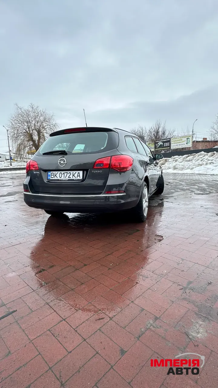 Opel Astra - фото 5