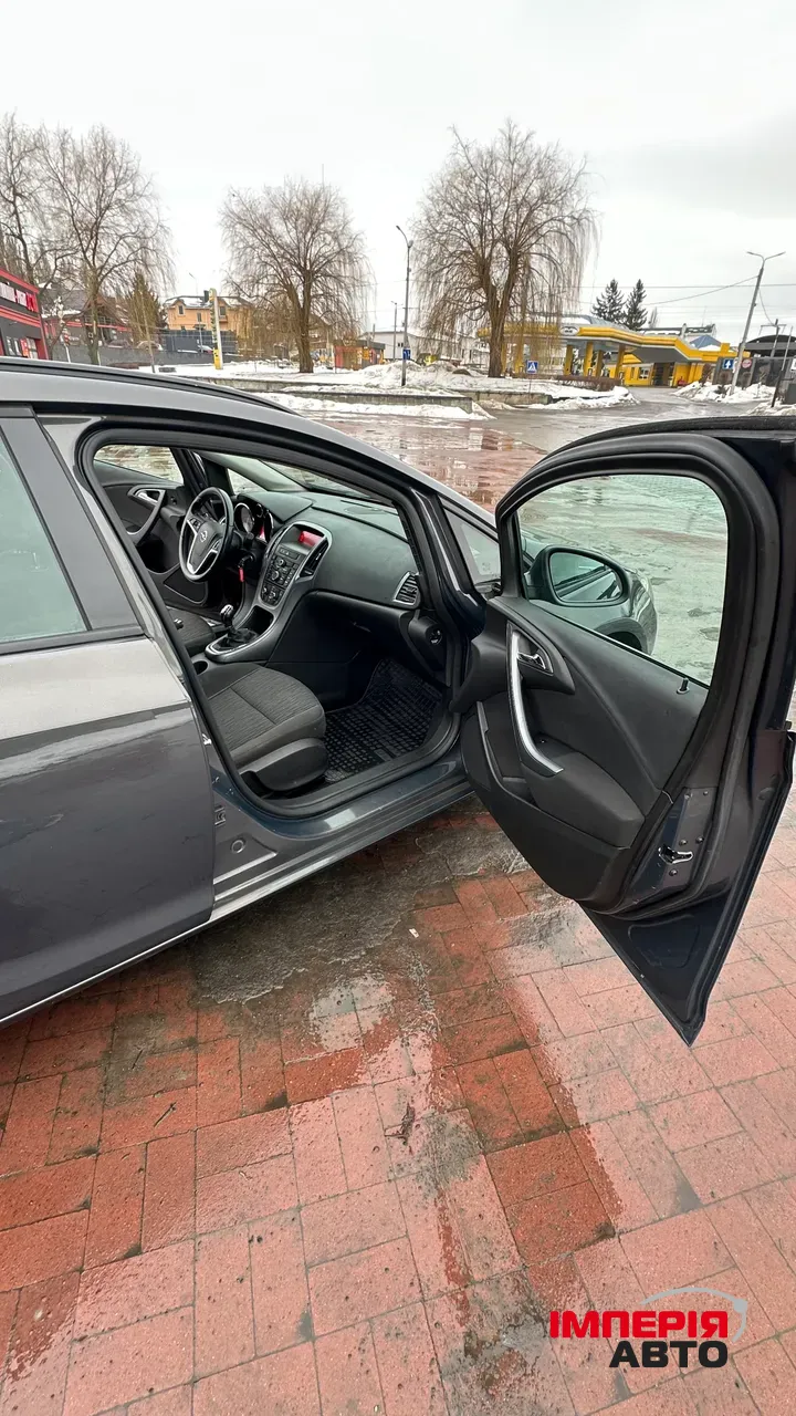 Opel Astra - фото 12